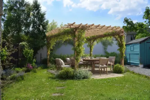 AI Generated Designs A stunning wooden pergola draped with climbing plants creates a mystical seating area for entertaining.
